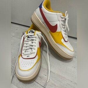 Nike High-Top Sneakers with Red and Yellow Accents